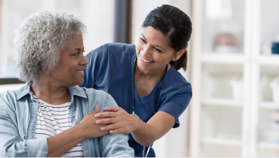 Nurse demonstrating attitude competency skills while working with a patient in a hospital setting | CHCM
