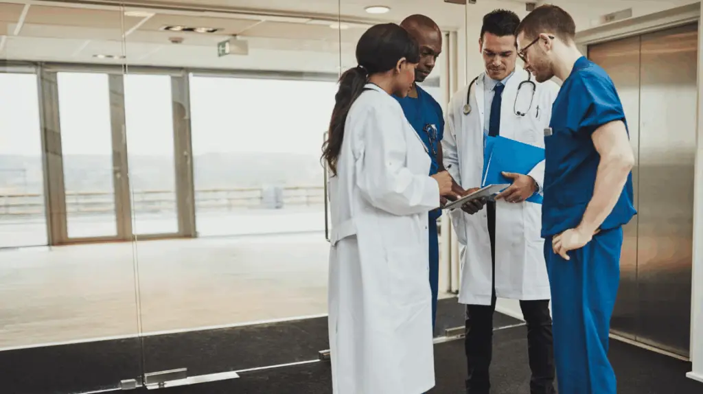 Transformational healthcare leader inspiring a diverse medical team