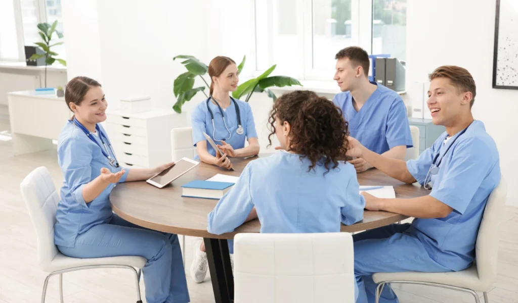 Nurses collaborating during a professional governance meeting | CHCM