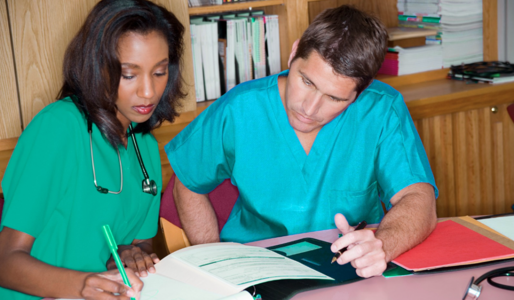 Nurse leaders analyzing empirical outcome data and performance graphs for Magnet® documentation | CHCM