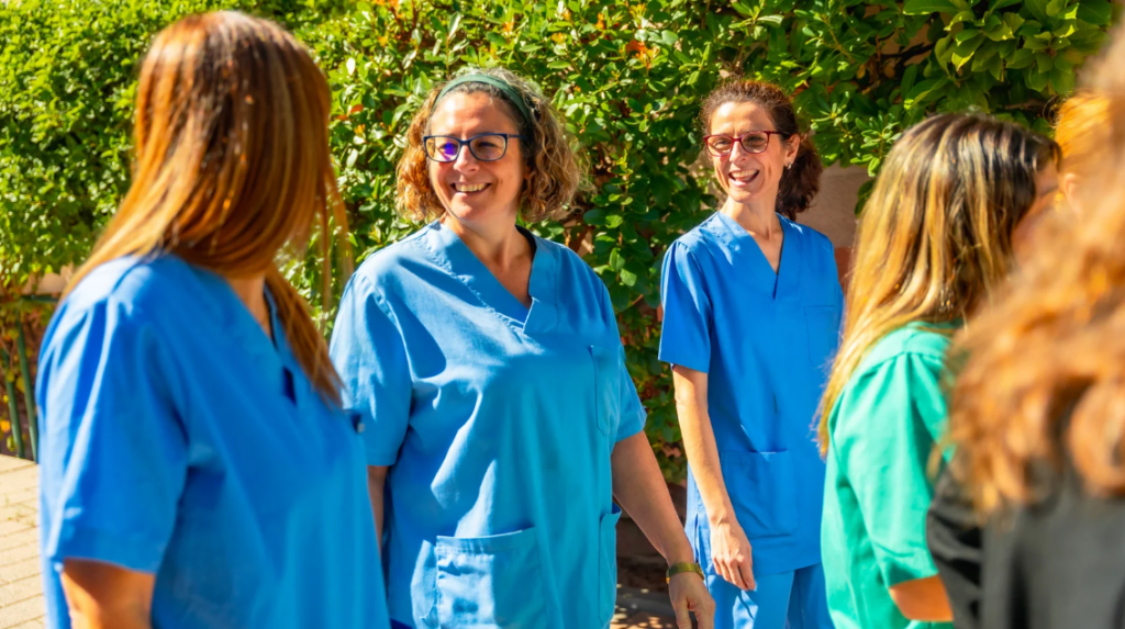 Health care leadership team learning outdoors — engaging in nature-based leadership education