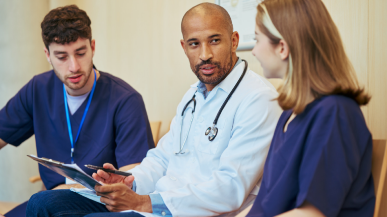 Interprofessional health care team collaborating in a professional governance council meeting