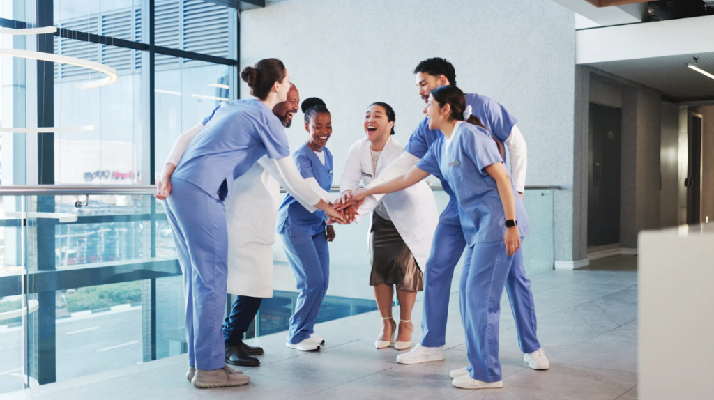 Team discussion illustrating professional role transitions in health care