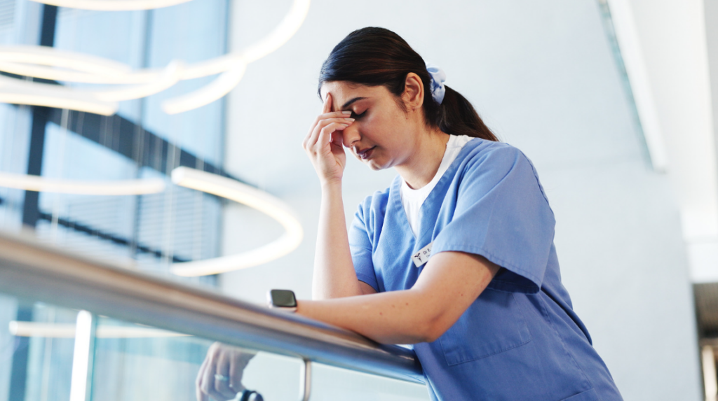 Health care professional reflecting on the challenges of starting over in a new role