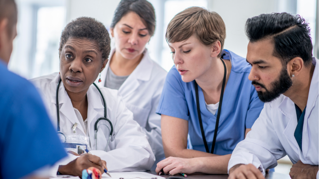 Healthcare leaders discussing organizational culture and team communication