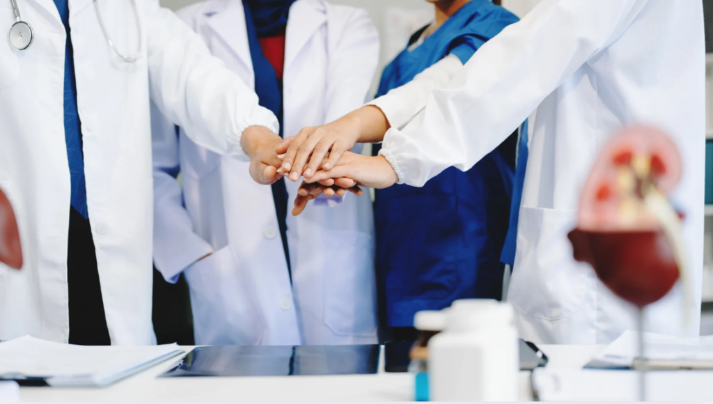 Health care team collaborating to improve workplace culture and communication