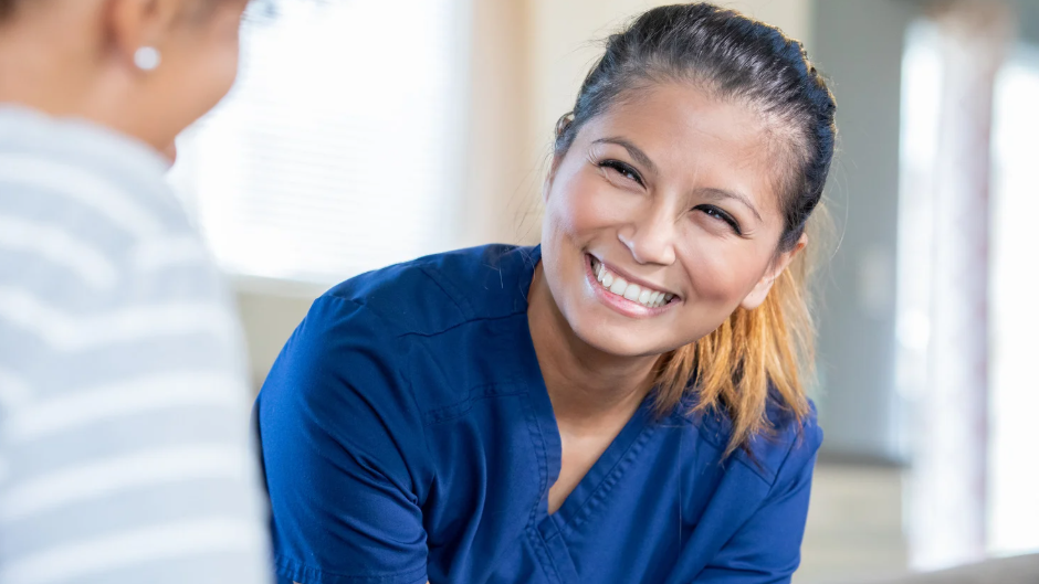 nurse connecting with patient and family through compassionate care 