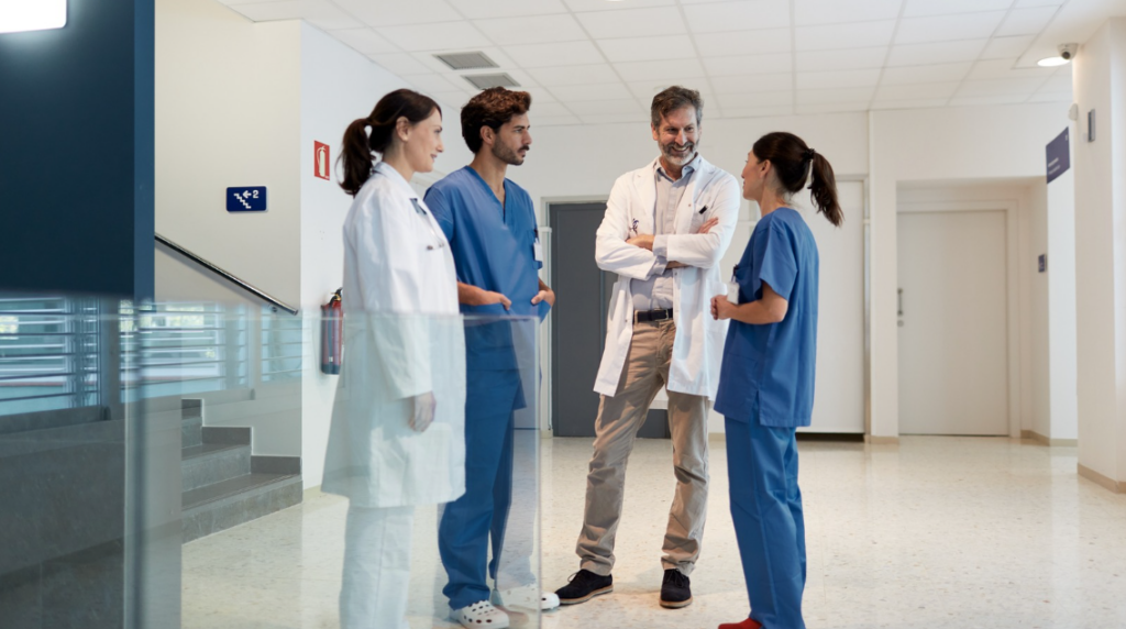 Healthcare leaders discussing workplace culture and interprofessional collaboration strategies | CHCM  
