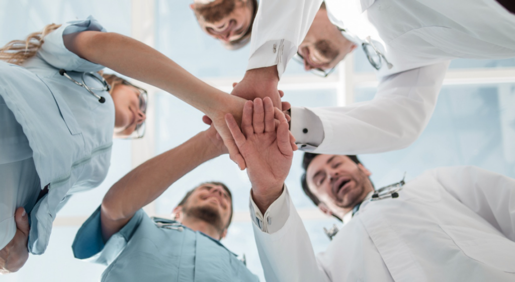Interdisciplinary healthcare professionals working together to improve patient outcomes | CHCM