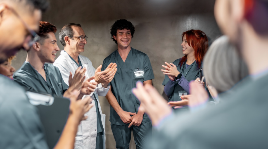 Healthcare professionals supporting healthy workplace culture and teamwork in a hospital environment | CHCM
