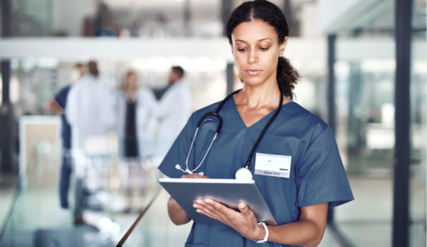 Nurse leader collaborating with staff nurses on a nursing research project in a healthcare organization | CHCM Nurse leader collaborating with staff nurses on a nursing research project in a healthcare organization | CHCM