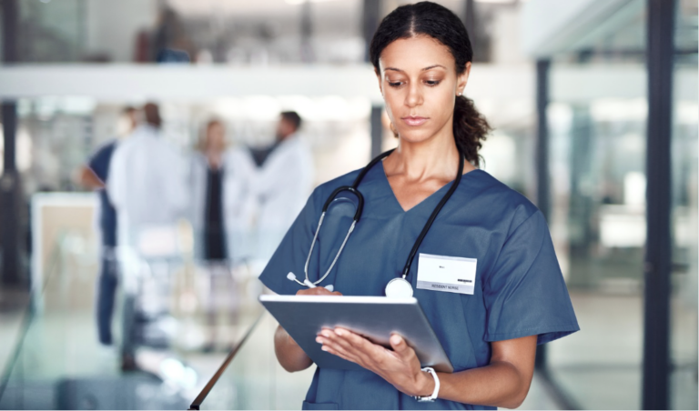 Nurse leader collaborating with staff nurses on a nursing research project in a healthcare organization | CHCM