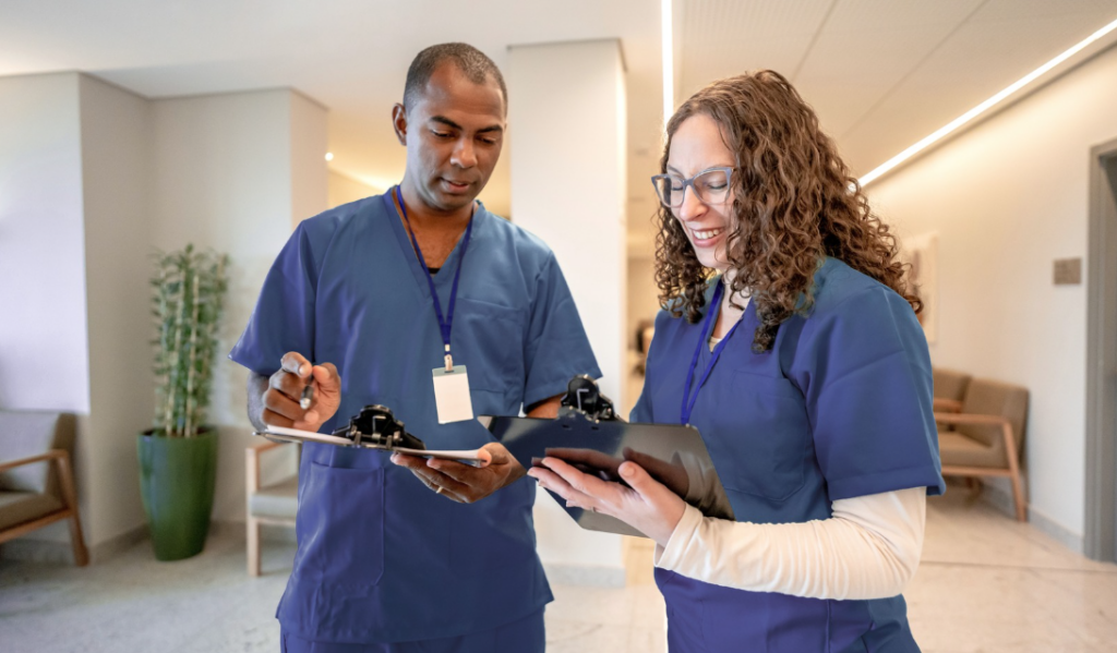 Healthcare leaders reviewing nursing quality metrics, patient outcomes, and performance indicators associated with Magnet® recognition.
