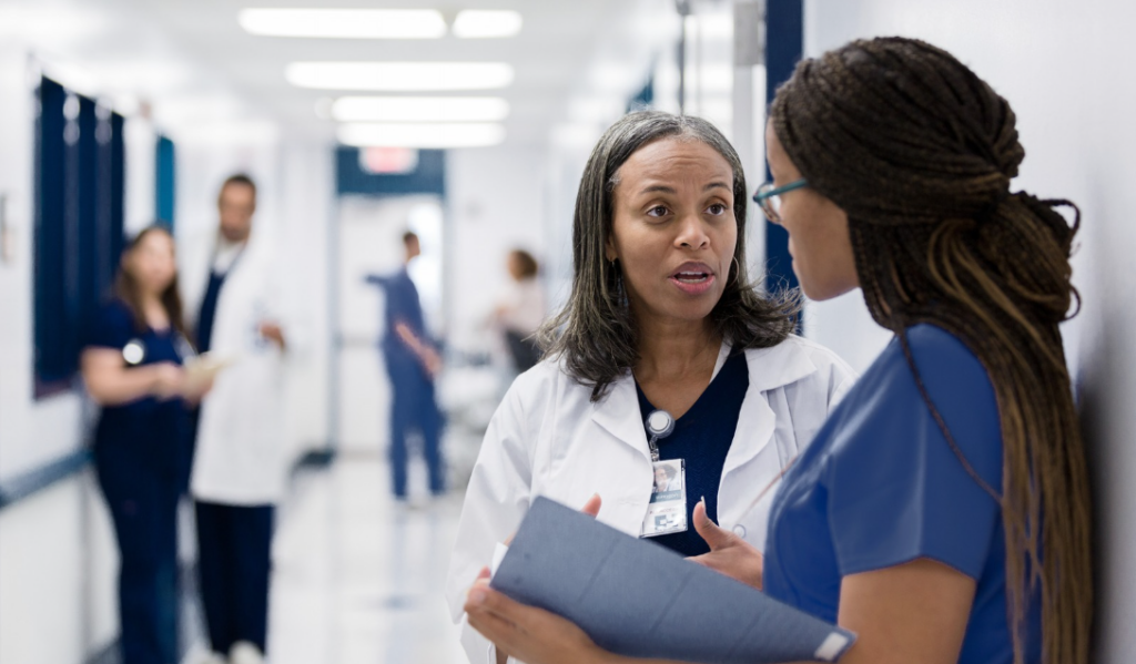 Healthcare leaders reviewing healthcare data and performance metrics to improve patient outcomes and organizational excellence | CHCM 