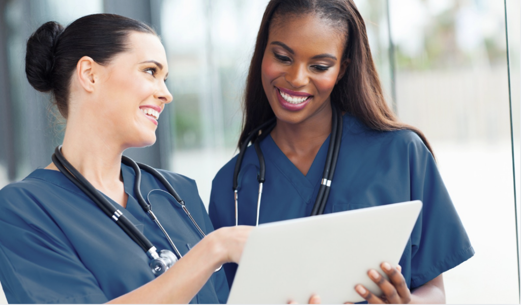 Experienced Magnet® Program Director mentoring a new nursing excellence leader | CHCM 