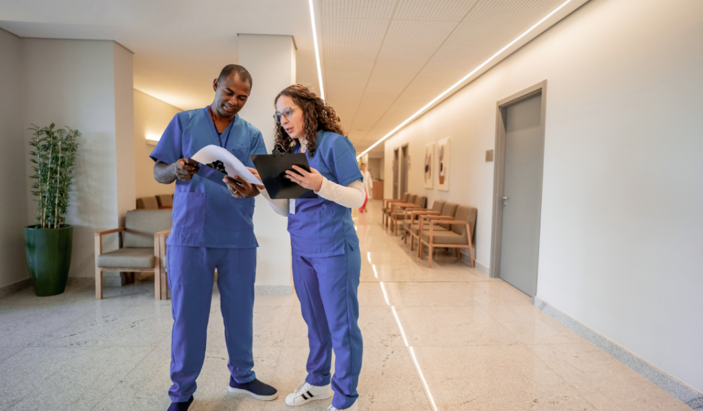 Nurses collaborating in a healthy workplace culture that supports professional governance and accountability | CHCM 