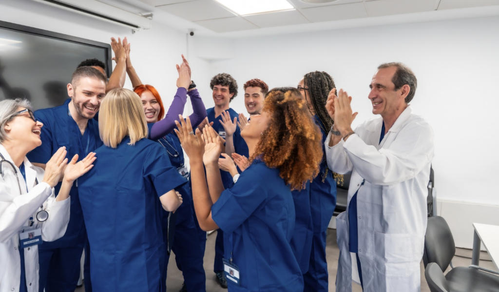 Healthcare team celebrating nursing excellence recognition through Magnet, Pathway to Excellence, or PTAP programs | CHCM 