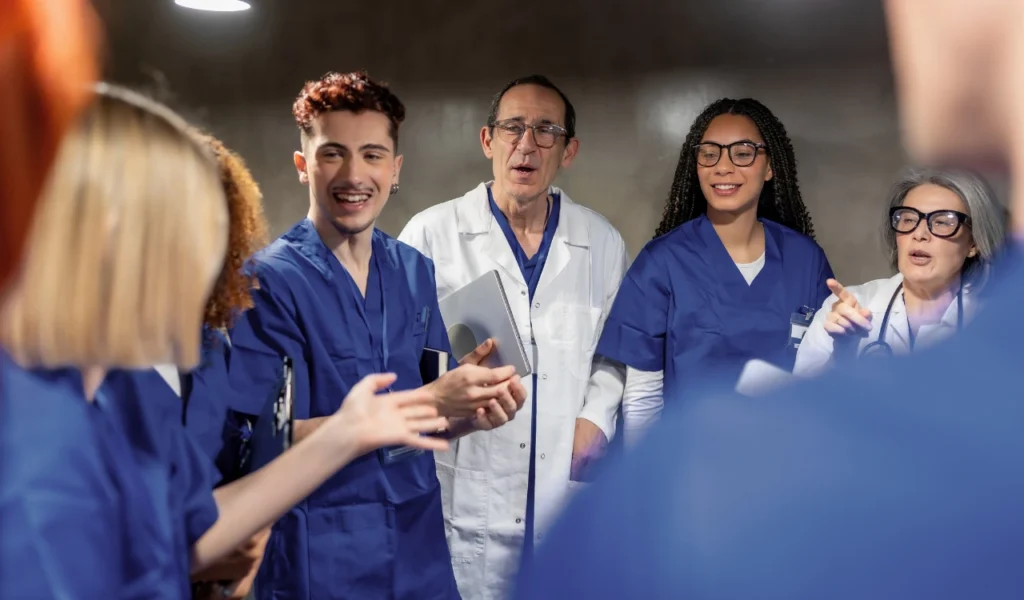 Healthcare professionals having a purposeful conversation that strengthens communication and trust | CHCM