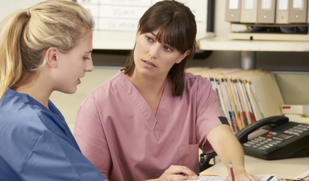 Healthcare leader listening to team members to address communication challenges and rebuild trust | CHCM