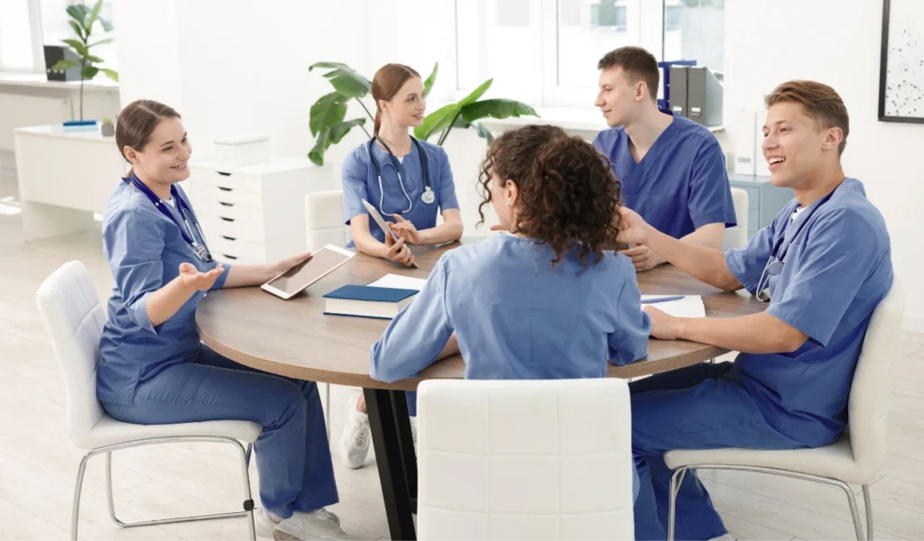 Nursing leaders discussing how to apply conference learning within their healthcare organization | CHCM