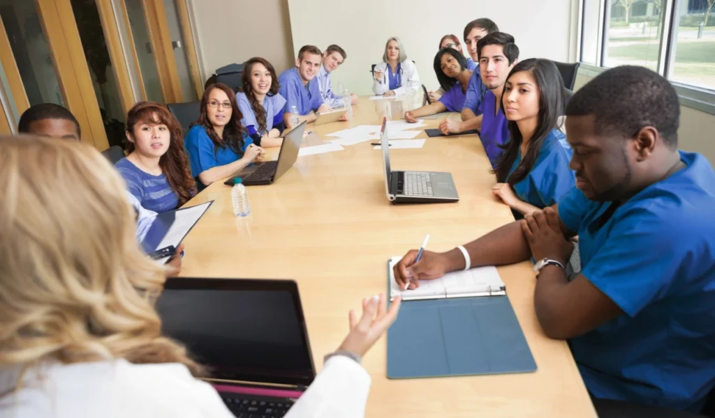 Professional governance council members reviewing data to evaluate a practice improvement | CHCM
