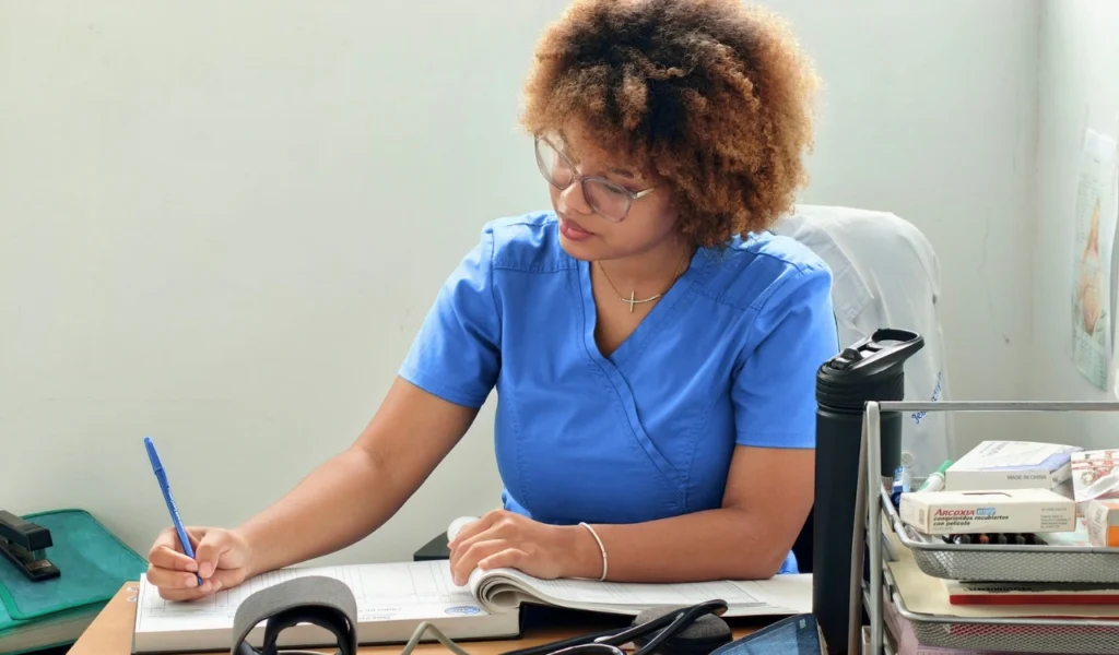 Nurse manager reviewing department staffing and budget information | CHCM