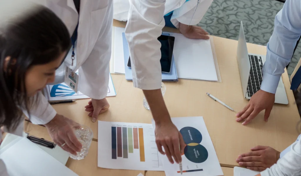 Healthcare leaders reviewing organizational priorities during a planning meeting | CHCM