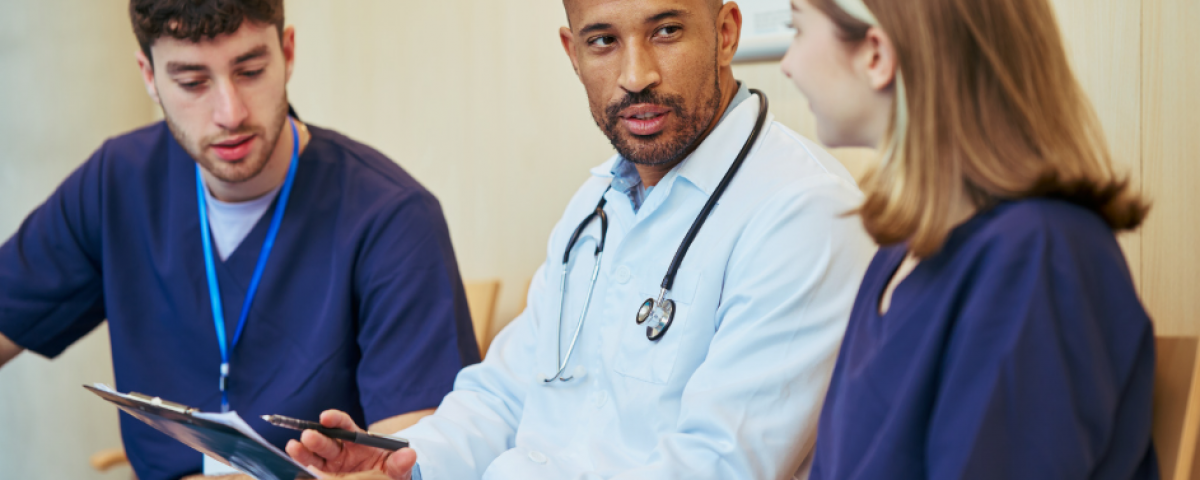 Interprofessional health care team collaborating in a professional governance council meeting